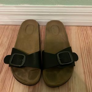 Size 6.5 women’s leather buckled slides